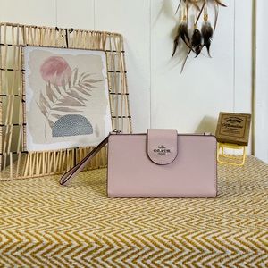 Authentic Coach tech phone wallet wristlet pouch brand new